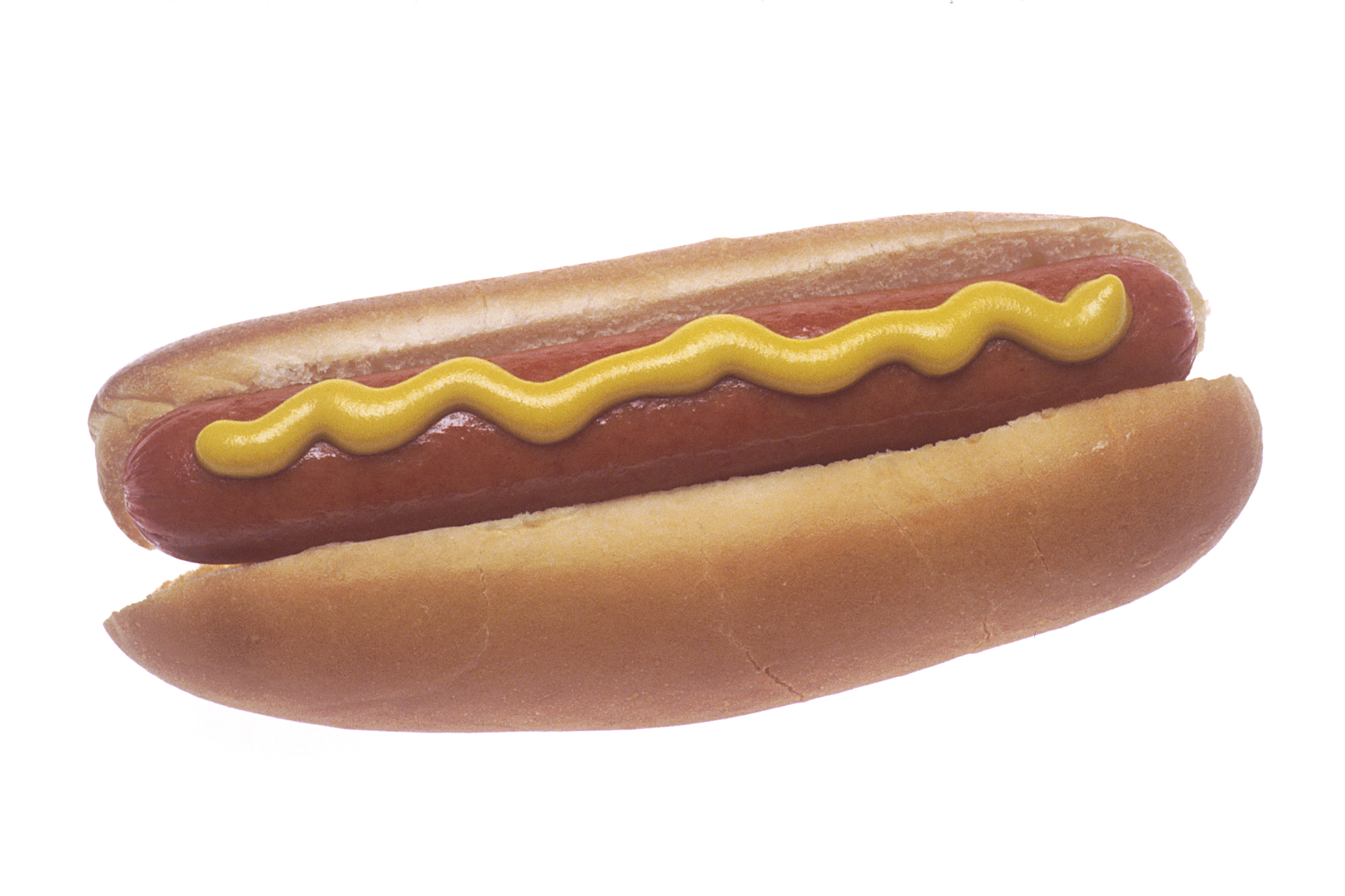 A sausage in a bun with mustard